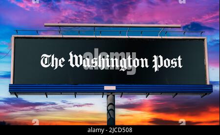 POZNAN, POL - MAY 1, 2022: Advertisement billboard displaying logo of The Washington Post, a major American daily newspaper published in Washington, D Stock Photo