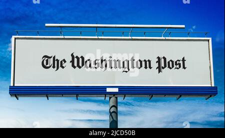 POZNAN, POL - MAY 1, 2022: Advertisement billboard displaying logo of The Washington Post, a major American daily newspaper published in Washington, D Stock Photo