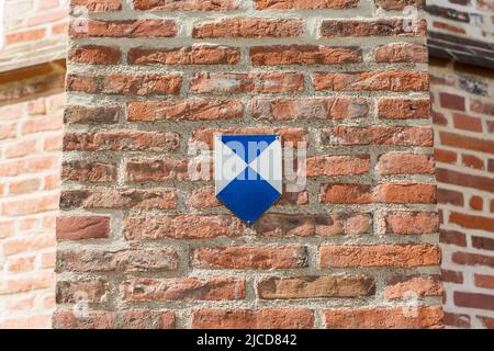 Landshut, Germany - Aug 15, 2021: Denkmalschutz sign on the facade of a historical building in the old town of Landshut. Stock Photo