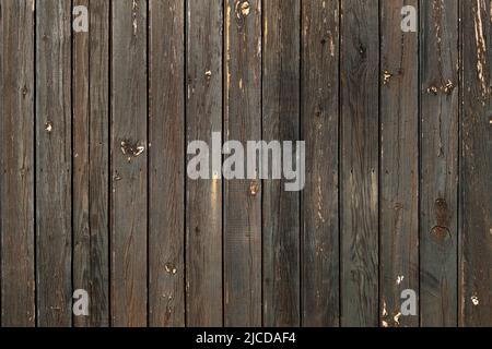 Dark brown painted rustic wooden cabin wall background Stock Photo