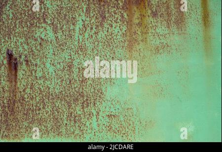 Green painted rusty iron sheet grunge texture Stock Photo
