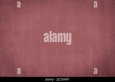 Rose colored stained wall plaster grunge background Stock Photo