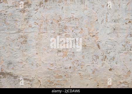 Old white limewashed wall with damp, distressed grunge background Stock Photo