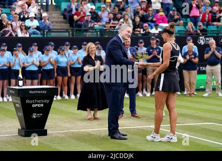 Brazil's Beatriz Haddad Maia is presented with the trophy after winning the women's singles final match on centre court on day nine of the Rothesay Open 2022 at Nottingham Tennis Centre, Nottingham. Picture date: Sunday June 12, 2022. Stock Photo