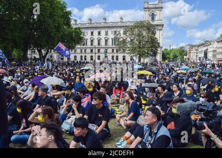 London, England, UK. 12th June, 2022. Thousands of Hong Kongers gathered in Parliament Square to mark the third anniversary of the brutal crackdown of the Hong Kong protests by the Chinese Government. (Credit Image: © Vuk Valcic/ZUMA Press Wire) Stock Photo