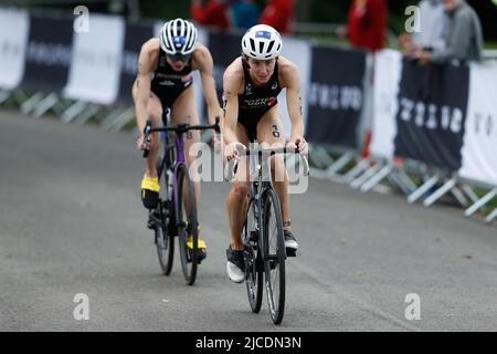 Great Britain's Beth Potter (right) and France's Cassandre Beaugrand in action during day one of the 2022 World Triathlon Series event at Roundhay Park, Leeds. Picture date: Saturday June 11, 2022. Stock Photo