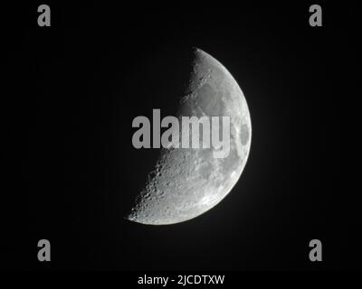 Waxing crescent moon over Old Bridge, New Jersey. The visible part of the moon increases until it gets to the half moon stage -11 Stock Photo