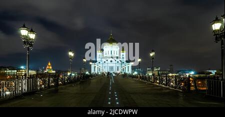 Cathedral of Christ the Saviour view from Patriarshy bridge at night, Moscow, Russia. This place is landmark of Moscow. Panorama with great church of Stock Photo