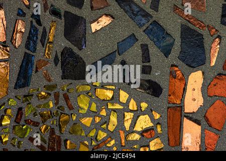 Abstract background, pieces of broken multi-colored glass. Stock Photo