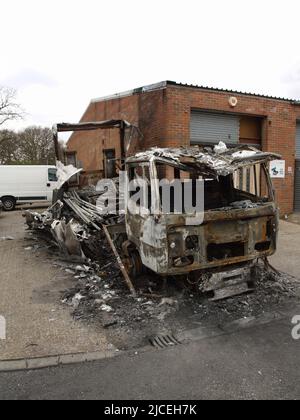 Burnt out vehicle in Netley Abbey, Southampton, Hampshire, UK Stock Photo