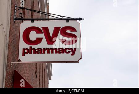 Salem, MA USA - June 12, 2022 - A CVS Pharmacy sign hangs in downtown Salem Stock Photo