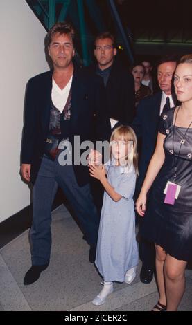 Don Johnson and daughter Dakota Johnson attend the premiere of 'Tin Cup' at the Museum of Modern Art in New York City on August 6, 1996.  Photo Credit: Henry McGee/MediaPunch Stock Photo