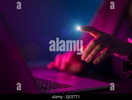Female manager is using laptop. Computer and hands close up. Stock Photo