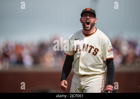 San Francisco Giants relief pitcher Dominic Leone (52) celebrates after striking out Los Angeles Dodgers designated hitter Chris Taylor (not pictured) Stock Photo