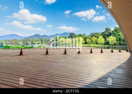 Wooden square and beautiful natural scenery in West Lake, Hangzhou, China. Stock Photo