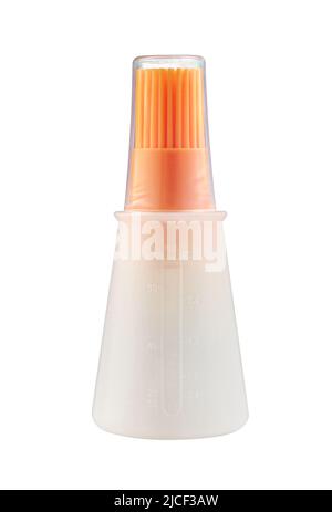Silicone portable oil bottle with basting brush and measuring scale Stock Photo