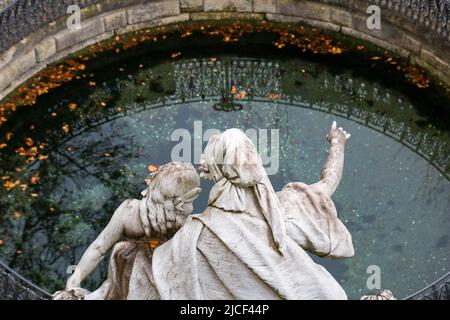 Donaueschingen, Germany - Nov 22, 2021: View on the spring of the Danube river. With sculpture 'Mother Baar shows her daughter Danube the way'. Stock Photo