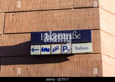 Heidelberg, Germany - Aug 25, 2021: Sign 'Hauptstraße'. In the city center of Heidelberg. With directions to some of the main attractions. Stock Photo