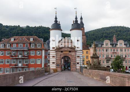 Heidelberg, Germany - Aug 27, 2021: View on the gate (Brückentor) of the old bridge ('Alte Brücke') of Heidelberg. No people. Stock Photo