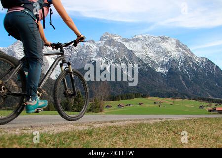 Bicycle tour with the mountain bike in the humpback meadows near Mittenwald, Germany, Bavaria, Upper Bavaria, Isar valley, road, path, bike, Karwendel mountains, Stock Photo