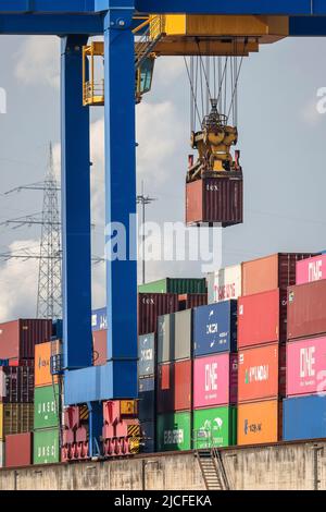 Duisburg, North Rhine-Westphalia, Germany - Duisburg Port, Container Port, duisport logport, at the Port of Duisburg on the Rhine, two of the world's largest container shipping companies, CMA CGM and NYK (Nippon Yusen Kabushiki Kaisha), operate the Duisburg Trimodal Terminal, D3T, together with duisport, at the logport logistics center in Duisburg-Rheinhausen, the world's largest inland container crane operates at the container terminal with seaport status. Stock Photo