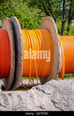 Cable drum with fiber optic cable, broadband expansion, Duisburg, North Rhine-Westphalia, Germany Stock Photo