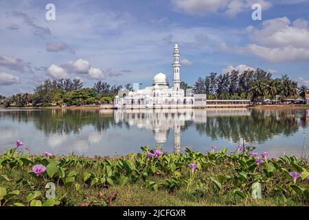 Kuala Ibai Floating Mosque or Tengku Tengah Zaharah Mosque, with its reflection in the water Kuala Ibai in Terengganu, Malaysia. Stock Photo