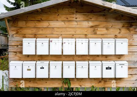 Norway, Troms og Finnmark, Tromsø, mailboxes for apartment buildings. Stock Photo