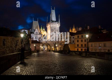 Charles Bridge with Bridge Tower on the Lesser Town, behind it Saint Nicholas Church, on the right Prague Burger with St. Vitus Cathedral, Prague, Czech Republic Stock Photo