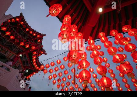 Kuala Lumpur, Malaysia - Feb 6th, 2022: Row of lighted red lanterns hanging at Thean Hou Temple, Kuala Lumpur Malaysia. Stock Photo