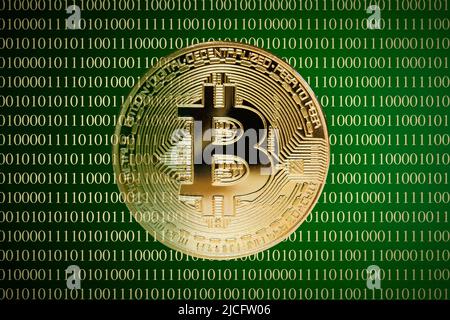 Bitcoin with data code background for internet and cyberspace Stock Photo