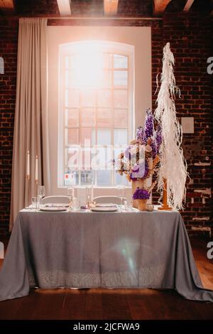 Festively set table with decoration Stock Photo