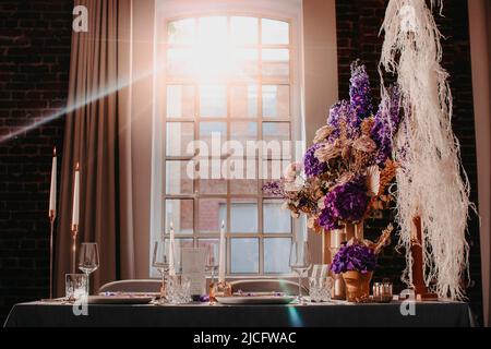 Festively set table with decoration Stock Photo