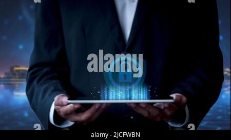 Cyber security network. Business man protecting data personal information on tablet. Padlock icon and internet technology networking connection on dig Stock Photo
