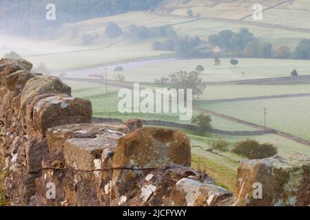 Stone Fence and fields, Burnsall, Yorkshire Dales National Park, United Kingdom Stock Photo