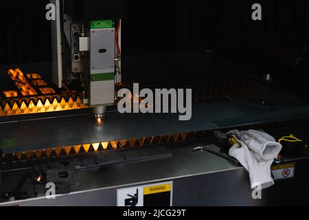 Automatic machine for cutting metal. Smart factory Stock Photo