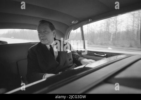 Berlin, Deutschland. 23rd Oct, 2020. Axel Caesar SPRINGER, Germany, publisher, half-length portrait, sitting on the back seat of a car and being chauffeured, newspaper publisher, Bild Zeitung; Qf.; Black and white shot ¬ Credit: dpa/Alamy Live News Stock Photo