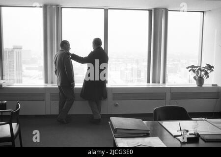 Axel Caesar SPRINGER, Germany, publisher, right, and Peter TAMM, long-standing management chairman of Axel Springer Verlag, are standing at the window of the Springer high-rise in Berlin and looking out over the city, January 15, 1966. ¬ Stock Photo