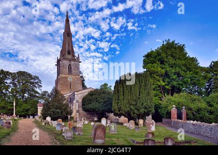 Vivid blue sky at St Peter's parish church in the village of Sharnbrook, Bedfordshire, England, UK Stock Photo