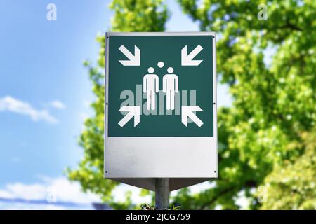 Green Emergency Assembly Point Sign Stock Photo