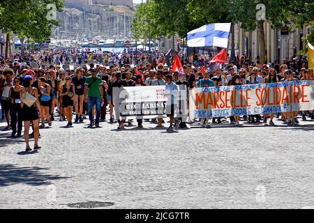 Protesters hold banners and flags expressing their opinions during the demonstration. People demonstrate against racism and against the far right, for equal rights and for social and climate justice in Marseille. (Photo by Gerard Bottino / SOPA Images/Sipa USA)