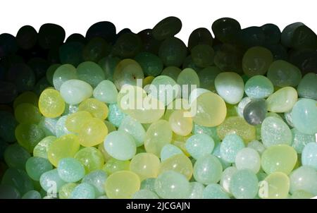 Colorful semi-precious stones. Different shapes  rock pebbles. Semi precious gem stones collection. Different kinds of stones in a variety of colours. Stock Photo
