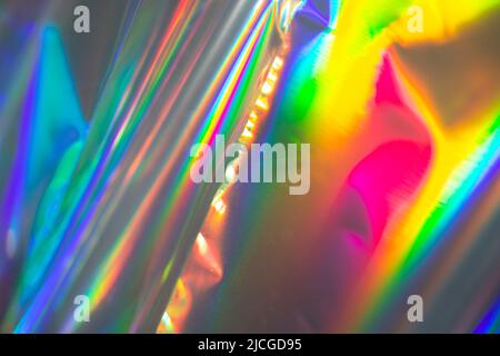 Rainbow holographic bokeh background. Multicolored overflows of color. Stock Photo