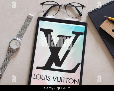 Mobile phone with logo of company LVMH Moet Hennessy Louis Vuitton