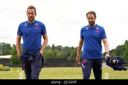 England's Harry Kane (left) walks with manager Gareth Southgate before a press conference at the Sir Jack Hayward Training Ground, Wolverhampton. Picture date: Monday June 13, 2022. Stock Photo