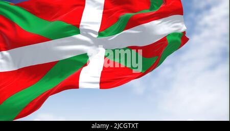 The Basque Country flag waving in the wind on a clear day. The Basque Country is an autonomous community in northern Spain Stock Photo