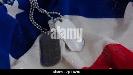 Military dog tags over american flag background with copy space Stock ...