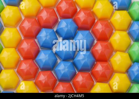 Close up of colorful plastic mosaic puzzle board game texture Stock Photo