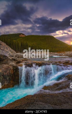 Elbow Falls Under A Sunrise Sky Stock Photo