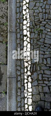 Textured, small pebbles from the sea from the island of Terceira May 2022 Stock Photo
